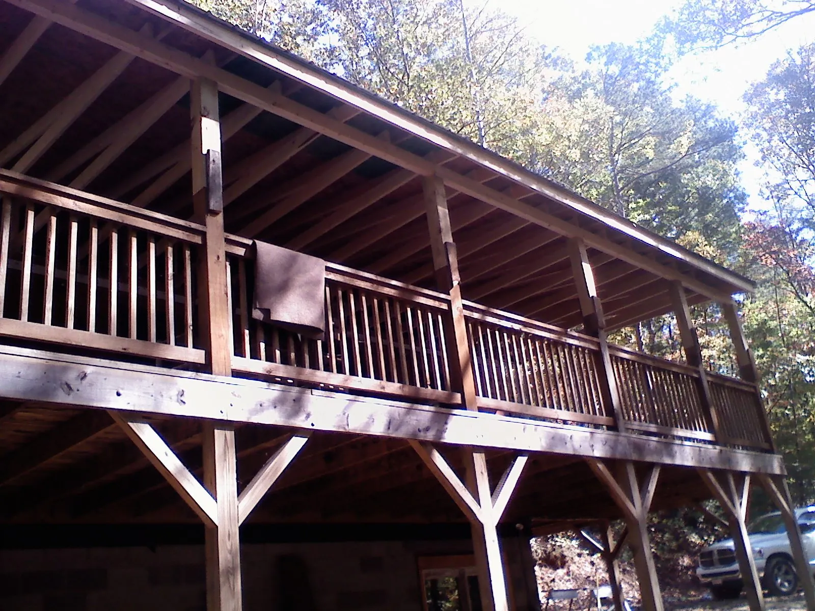 Timber framing under a new elevated porch and deck — Roof Leak Repair in Pomona by Roofing Brothers